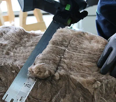 Cutting insulation between rafters