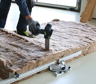 Cutting insulating material to size