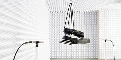 A Festool eccentric sander in the acoustic cabin