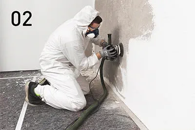 Remove defective areas of plaster and old coatings using the renovation miller or the surface-restoration grinder.