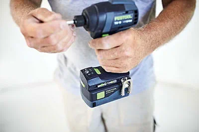 The Festool TID 18 cordless impact screwdriver in operation on the construction site